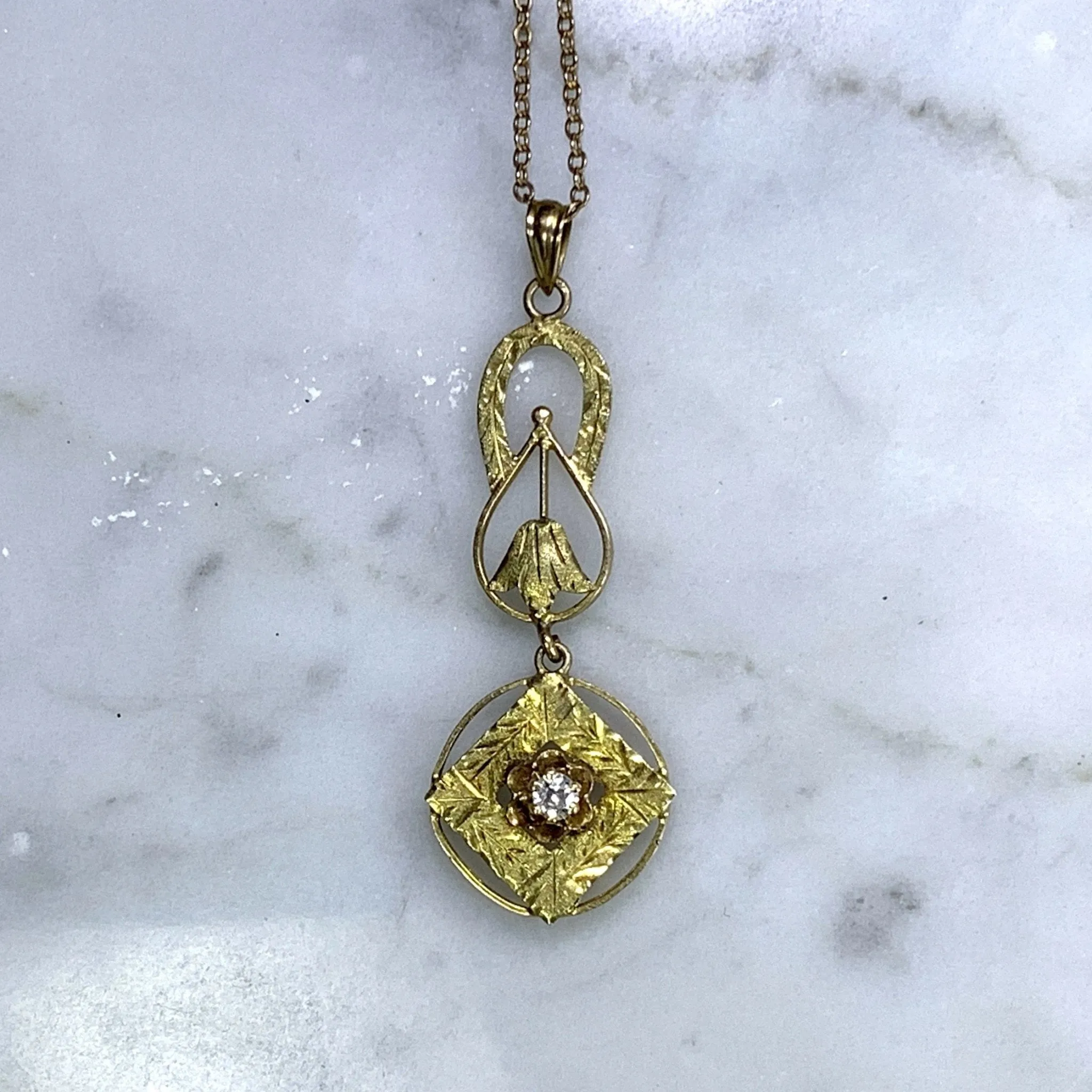 1930s Diamond Pendant in 10K Yellow Gold Filigree. Drop Pendant with Art Nouveau Style.