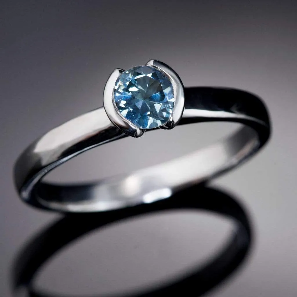 Fair Trade Teal / Blue Montana Sapphire Tulip Half Bezel Solitaire Engagement Ring